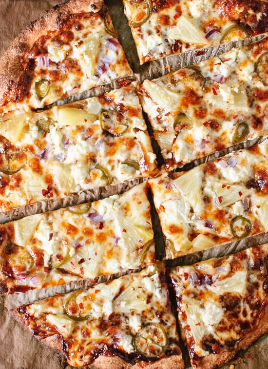 Barbecue pizza with sweet pineapple, spicy jalapeños and a sprinkle of salty feta! Totally irresistible. cookieandkate.com