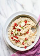 Ultra creamy, toasted steel-cut oats. Learn how to cook a batch that lasts all week! cookieandkate.com